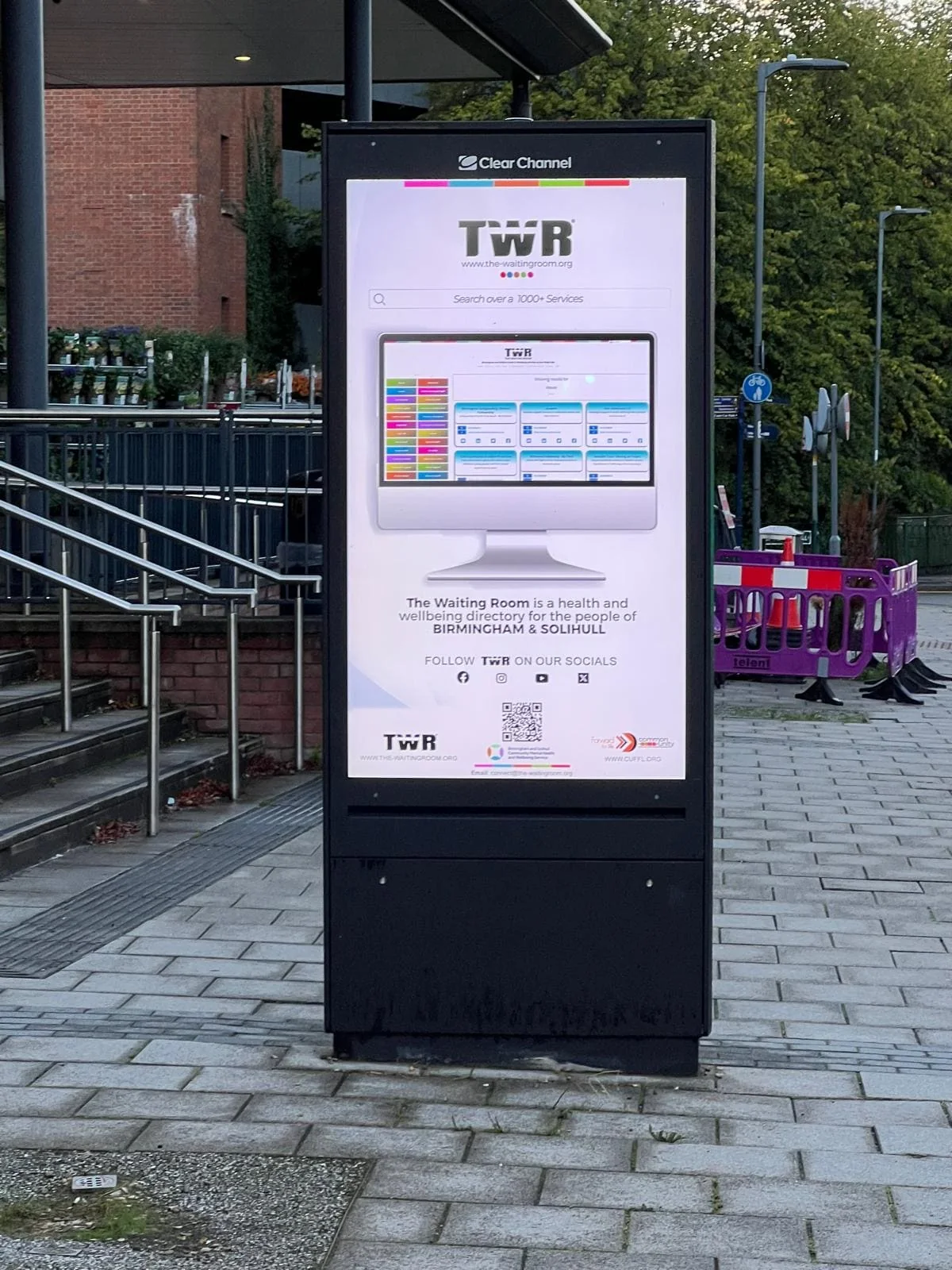 The Waiting Room poster on a city advertising panel